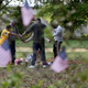 People join hands in prayer as they visit a memorial set up on the site where Walter Scott was killed April 11, 2015, in North Charleston, S.C. (Joe Raedle/Getty Images)